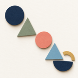 Original paper-cut circle and triangle pattern in Theeles brand colors