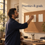 Illustrative adult choosing priorities and goals with blank cards, not workbook page previews